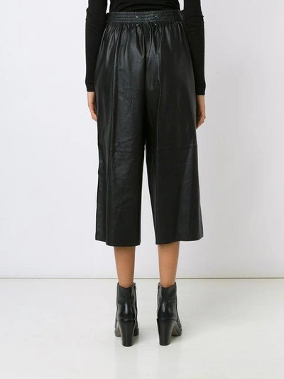 Shop Maison Margiela Defile Leather Trousers - Black