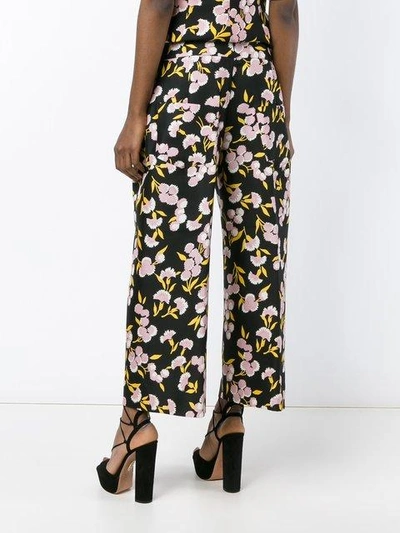 Shop Marni Floral Print Trousers In Black