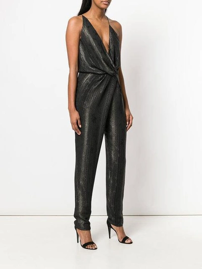 Shop Saint Laurent Metallic Striped Jumpsuit - Black