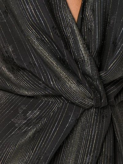 Shop Saint Laurent Metallic Striped Jumpsuit - Black