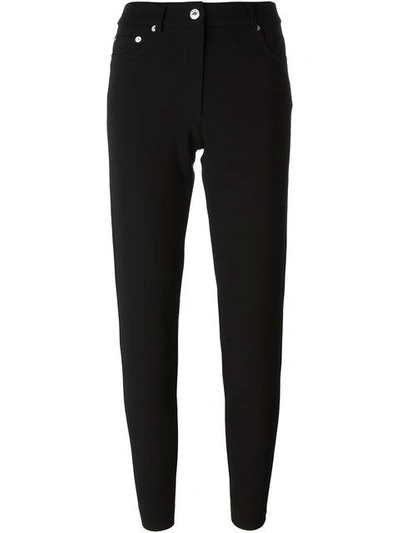 Shop Moschino Slim Fit Trousers In Black