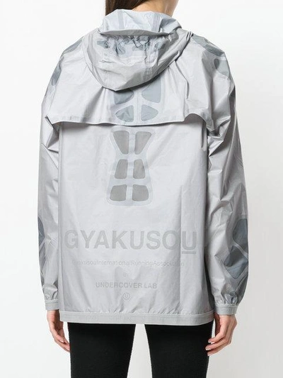 Shop Nike Gyakusou Hooded Windbreaker Jacket - Grey