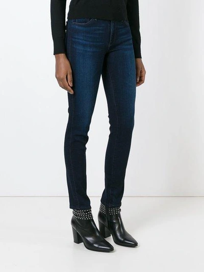 Shop Ag Mid-rise Skinny Jeans In Blue