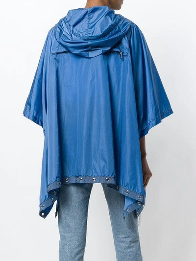 Shop Moncler Grommet Trim Hooded Poncho In Blue