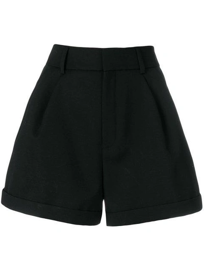 Shop Saint Laurent Flared Design Shorts In Black