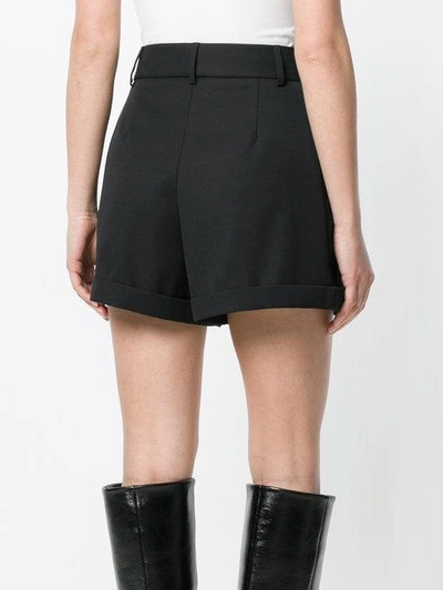 Shop Saint Laurent Flared Design Shorts In Black