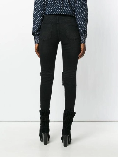 Shop One Teaspoon Distressed Skinny Jeans In Black