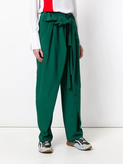 Shop Stella Mccartney Ruffle Trim Trousers In Green