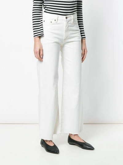 Shop Simon Miller Wide Leg Jeans In White