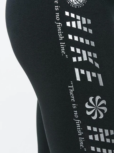Shop Nike Logo Slogan Print Leggings