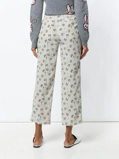 Shop Prada Floral Print Trousers In F0424 Nube
