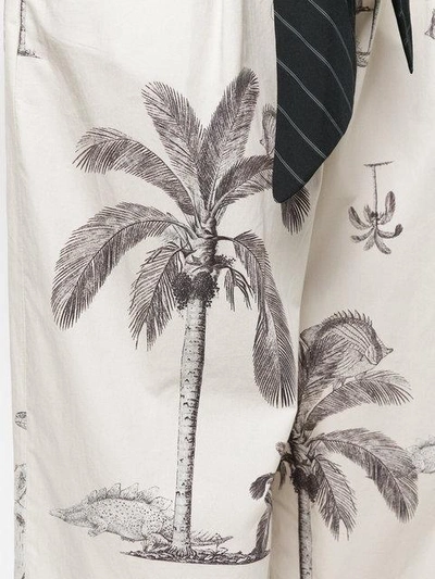 Shop Odeeh Palm Tree Print Trousers