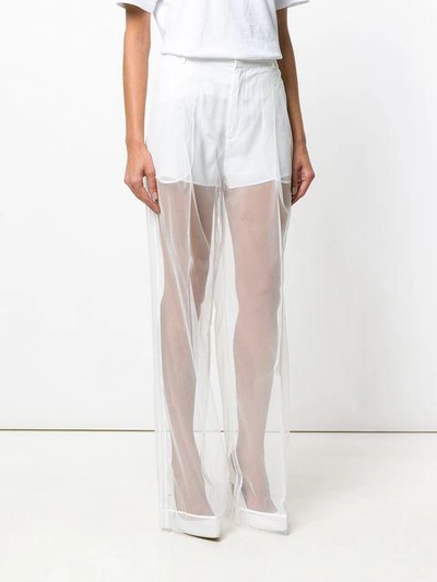 Shop Givenchy Transparent Flared Trousers