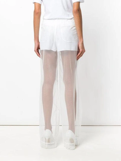Shop Givenchy Transparent Flared Trousers