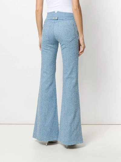 Shop Balmain 6 Button Flocked Wide Leg Jeans In Blue