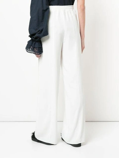 Shop Goen J Wide Leg Trousers With Lace Side Band In White