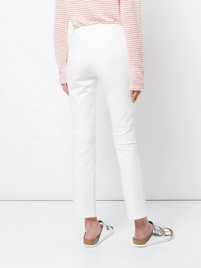 Shop Veronica Beard Metro Cropped Kicked Flare Trousers In White