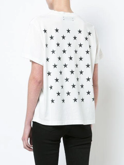 Shop Amiri Celebrate Star-print T-shirt - White