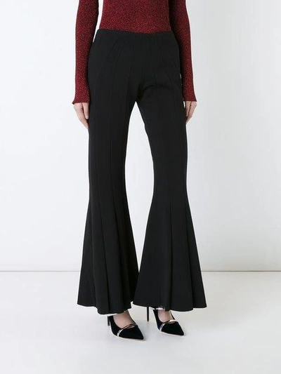 Shop Robert Wun Peplum Flared Trousers In Black