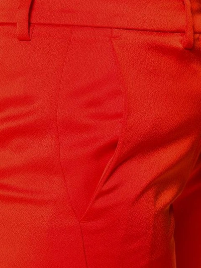 Shop Msgm Slit Cuff Trousers In Red