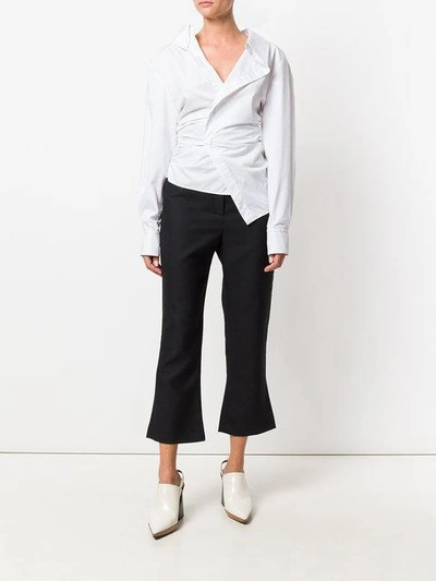 Shop Jacquemus Flared Cropped Trousers - Black