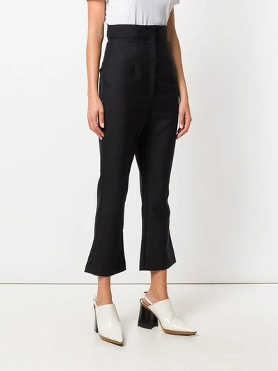 Shop Jacquemus Flared Cropped Trousers - Black