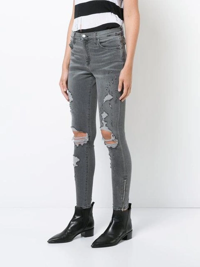 Shop Amiri Thrasher Skinny Jeans In Grey