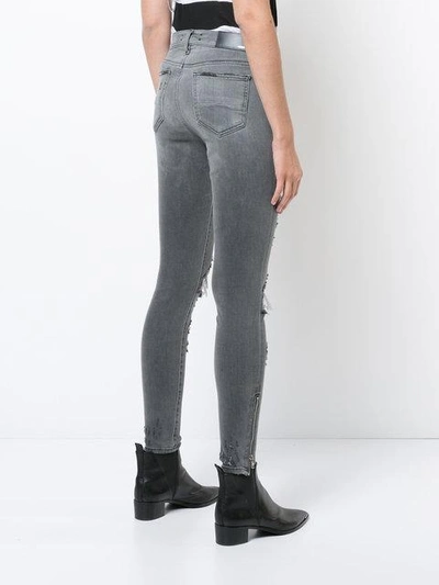 Shop Amiri Thrasher Skinny Jeans In Grey