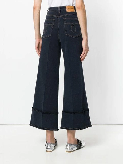 wide-leg denim trousers