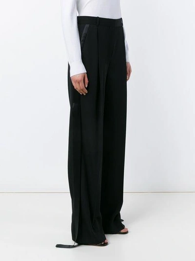 Shop Givenchy Cady Wool Trousers In Black