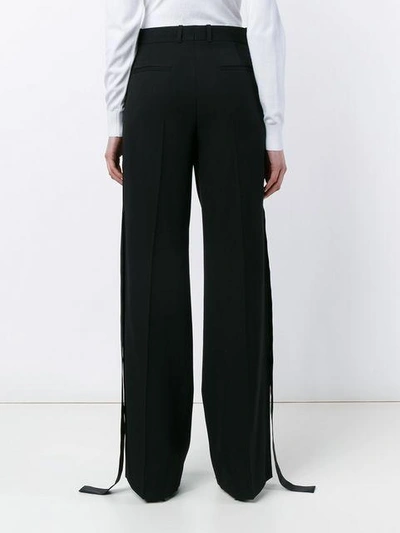 Shop Givenchy Cady Wool Trousers In Black