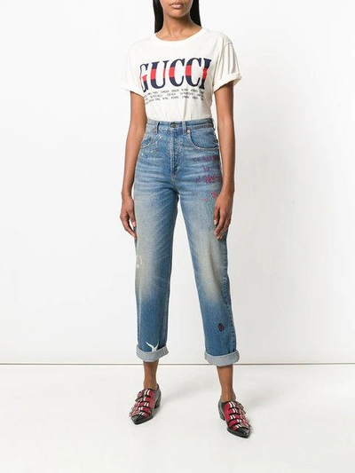 Shop Gucci Cropped Embroidered Jeans In Blue