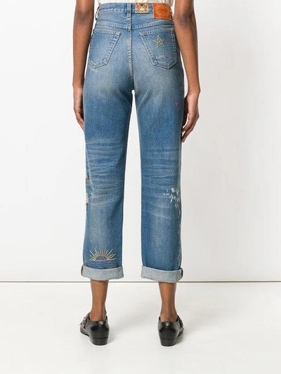 Shop Gucci Cropped Embroidered Jeans In Blue
