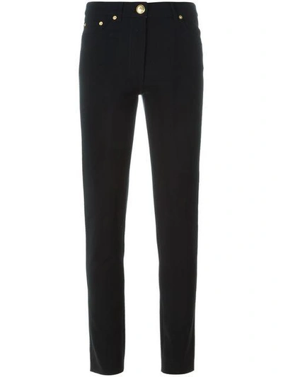 Shop Moschino Straight Leg Trousers In Black