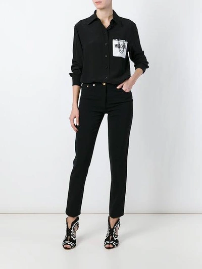 Shop Moschino Straight Leg Trousers In Black