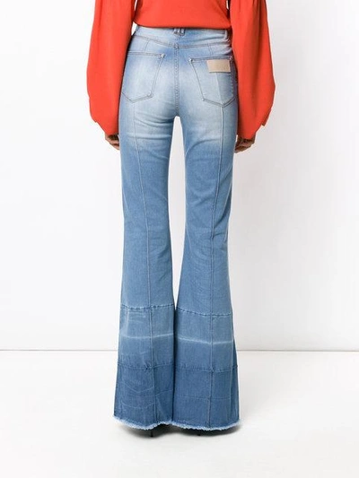 Shop Amapô Lyon Flared Jeans In Blue