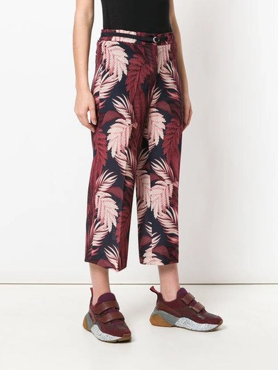 Shop Moncler Cropped Floral Trousers In Black