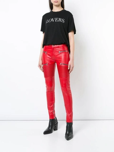 Shop Amiri Lx1 Skinny Leather Trousers In Red