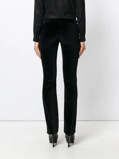 Shop Barbara Bui Pinstripe Flared Trousers - Black