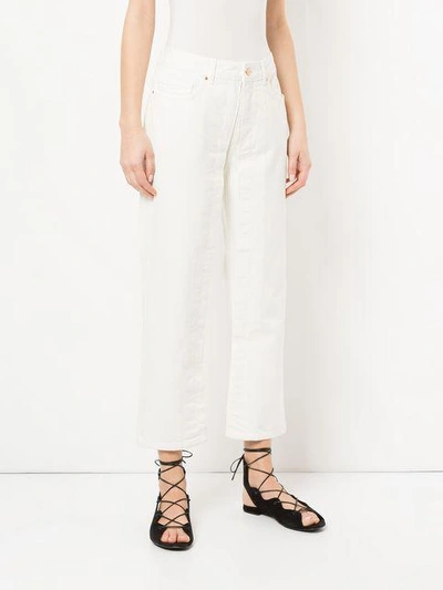 Shop Aalto Cropped Flared Jeans In White