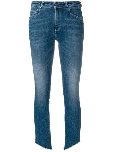 cropped faded jeans