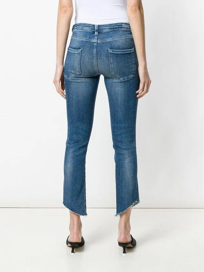 cropped faded jeans