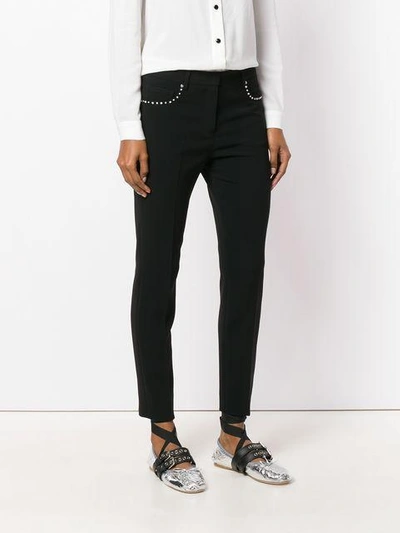 Shop Miu Miu Crystal Rivet Cropped Trousers In Black