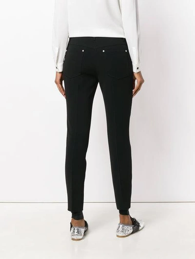 Shop Miu Miu Crystal Rivet Cropped Trousers In Black