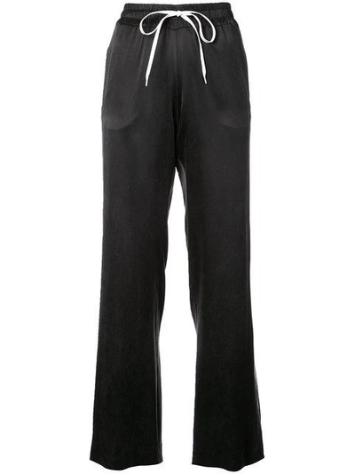 Shop Amiri Wide Leg Track Pants In Black