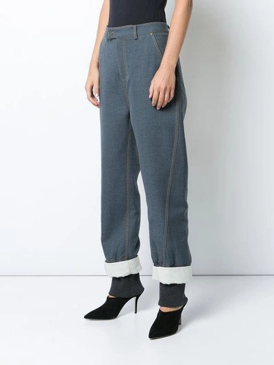 Shop Rosie Assoulin Embellished Cuff Trousers In Blue