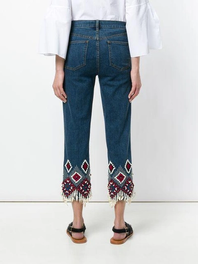 Shop Tory Burch Embroidered Cuff Jeans In Blue