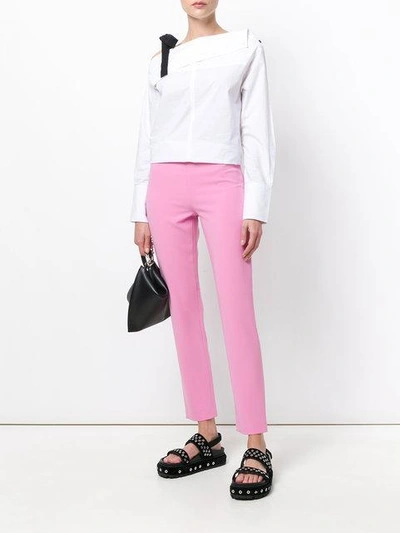 Shop Moschino High Waisted Crop Trousers In Pink