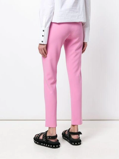 Shop Moschino High Waisted Crop Trousers In Pink