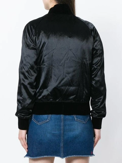 Shop Saint Laurent Satin Bomber Jacket - Black